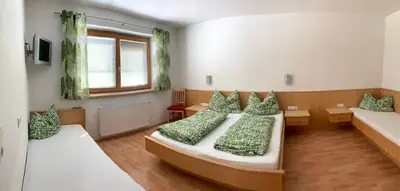 Ein Bett oder Betten in einem Zimmer der Unterkunft Appartements Samerhof - TOP 1