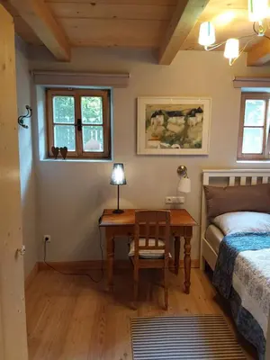 Ein Bett oder Betten in einem Zimmer der Unterkunft Ferienwohnung Schönwörth