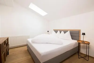 Ein Bett oder Betten in einem Zimmer der Unterkunft Appartements Huber