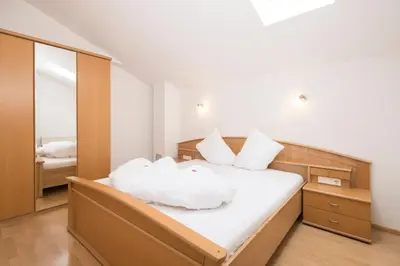 Ein Bett oder Betten in einem Zimmer der Unterkunft Appartements Huber