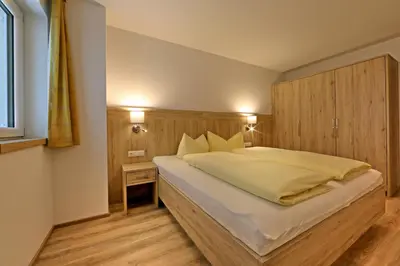 Ein Bett oder Betten in einem Zimmer der Unterkunft Apartment Jäger