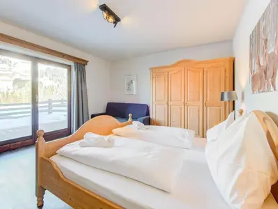 Ein Bett oder Betten in einem Zimmer der Unterkunft Apartment in Kirchberg near Ski Slopes