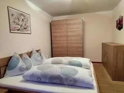 Ein Bett oder Betten in einem Zimmer der Unterkunft Haus Valentina