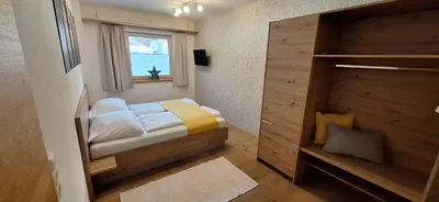 Ein Bett oder Betten in einem Zimmer der Unterkunft Apartment Wechselberger Tobias & Jaqueline