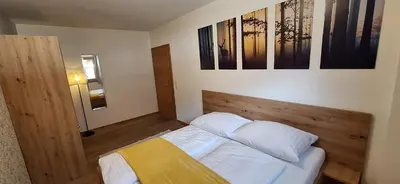Ein Bett oder Betten in einem Zimmer der Unterkunft Apartment Wechselberger Tobias & Jaqueline
