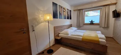 Ein Bett oder Betten in einem Zimmer der Unterkunft Apartment Wechselberger Tobias & Jaqueline