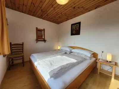 Ein Bett oder Betten in einem Zimmer der Unterkunft Haus Bergleiten