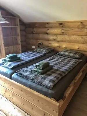 Ein Bett oder Betten in einem Zimmer der Unterkunft Lengalm Hütten I & II mit Sauna