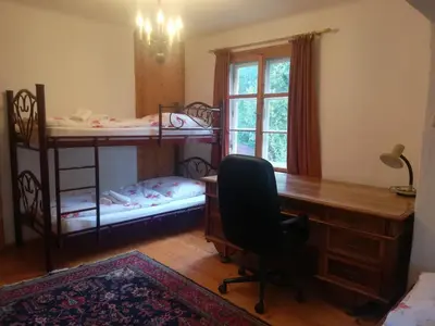 Ein Bett oder Betten in einem Zimmer der Unterkunft Villa Momo