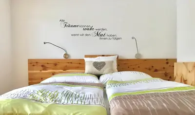 Ein Bett oder Betten in einem Zimmer der Unterkunft Ferienwohnung Lechner Traudi Kreuzschied 141