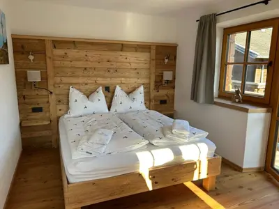 Ein Bett oder Betten in einem Zimmer der Unterkunft Wimmerhof - Appartement Bergsonne