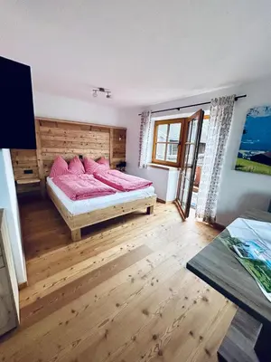 Ein Bett oder Betten in einem Zimmer der Unterkunft Wimmerhof - Appartement Bergsonne
