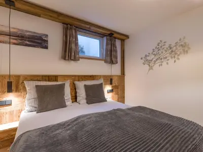 Ein Bett oder Betten in einem Zimmer der Unterkunft Appartement Holznest
