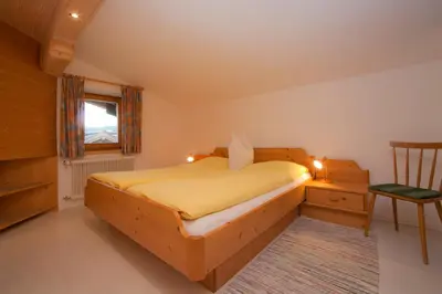 Ein Bett oder Betten in einem Zimmer der Unterkunft BED and BREAKFAST Pension Foidl