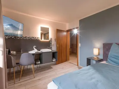Ein Bett oder Betten in einem Zimmer der Unterkunft Appartementhaus FICHTERN