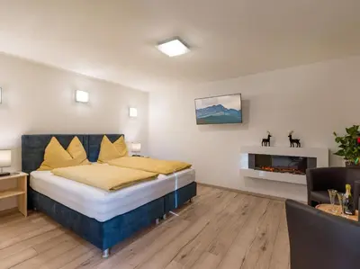 Ein Bett oder Betten in einem Zimmer der Unterkunft Appartementhaus FICHTERN