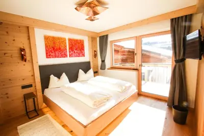 Ein Bett oder Betten in einem Zimmer der Unterkunft Enzian Wohnung B