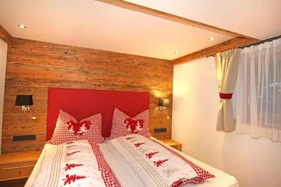 Ein Bett oder Betten in einem Zimmer der Unterkunft Enzian Wohnung H