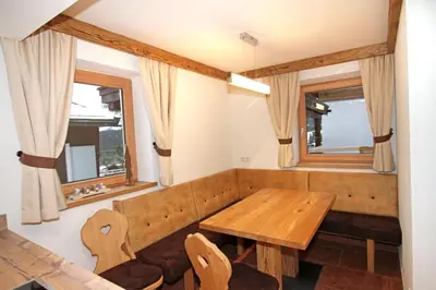 Ein Sitzbereich in der Unterkunft Enzian Wohnung H