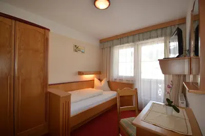 Ein Bett oder Betten in einem Zimmer der Unterkunft Landhaus Montana