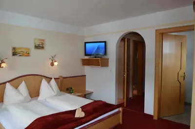Ein Bett oder Betten in einem Zimmer der Unterkunft Landhaus Montana