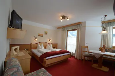 Ein Bett oder Betten in einem Zimmer der Unterkunft Appartement für 4 Personen