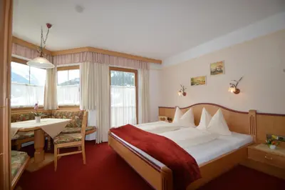 Ein Bett oder Betten in einem Zimmer der Unterkunft Appartement für 4 Personen