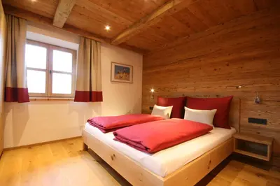 Ein Bett oder Betten in einem Zimmer der Unterkunft Almliesl Wohnungen UTTE-570