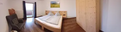 Ein Bett oder Betten in einem Zimmer der Unterkunft Ferienwohnung Kramerhof