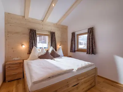 Ein Bett oder Betten in einem Zimmer der Unterkunft Ferienhaus Auerbauer