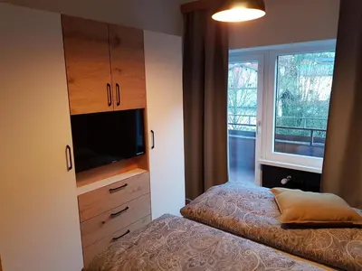 Ein Bett oder Betten in einem Zimmer der Unterkunft Exklusiv Apartment Sonnenalp