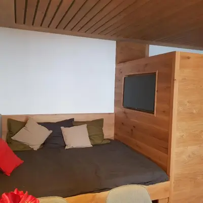 Ein Bett oder Betten in einem Zimmer der Unterkunft Exklusiv Apartment Sonnenalp