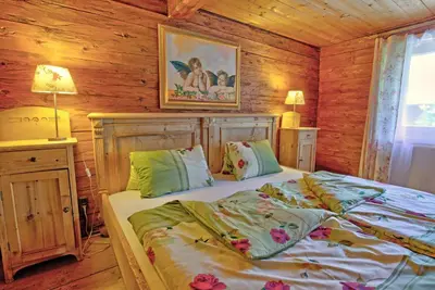 Ein Bett oder Betten in einem Zimmer der Unterkunft Chalet Rastenhof - Urlaub auf dem Bauernhof in Österreich