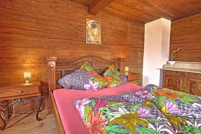 Ein Bett oder Betten in einem Zimmer der Unterkunft Chalet Rastenhof - Urlaub auf dem Bauernhof in Österreich