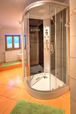 Ein Badezimmer in der Unterkunft Chalet Rastenhof - Urlaub auf dem Bauernhof in Österreich