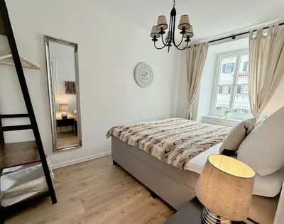 Ein Bett oder Betten in einem Zimmer der Unterkunft BELLE KITZ PURE im Zentrum by Belle Stay