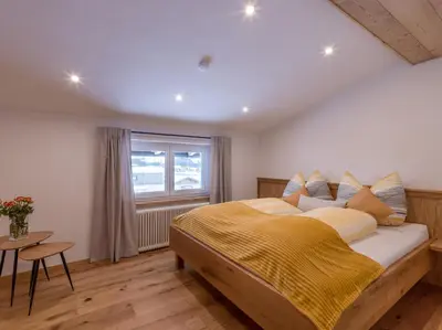 Ein Bett oder Betten in einem Zimmer der Unterkunft Haus Chorblick
