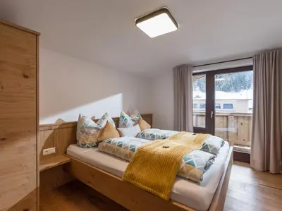 Ein Bett oder Betten in einem Zimmer der Unterkunft Haus Chorblick