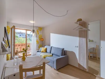 Ein Sitzbereich in der Unterkunft Ferienwohnung Wetzinger