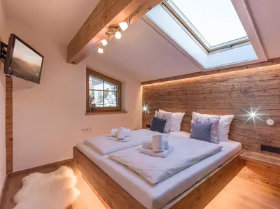 Ein Bett oder Betten in einem Zimmer der Unterkunft Chalet Weinberg T1 & T2 by Apartment Managers