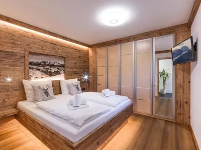 Ein Bett oder Betten in einem Zimmer der Unterkunft Chalet Weinberg T1 & T2 by Apartment Managers