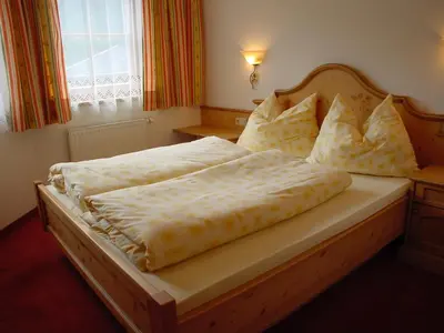 Ein Bett oder Betten in einem Zimmer der Unterkunft Landhaus Marten