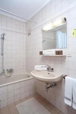 Ein Badezimmer in der Unterkunft Café Rainer