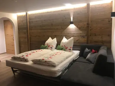 Ein Sitzbereich in der Unterkunft Appartement Schneekristall