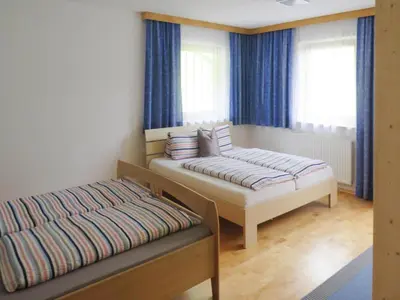 Ein Bett oder Betten in einem Zimmer der Unterkunft Holiday Home in Fügenberg near Spieljochbahn