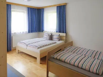 Ein Bett oder Betten in einem Zimmer der Unterkunft Holiday Home in Fügenberg near Spieljochbahn