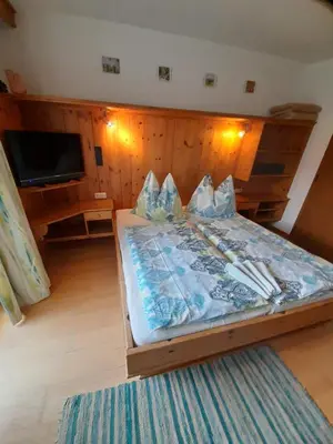 Ein Bett oder Betten in einem Zimmer der Unterkunft Haus Rosenegg