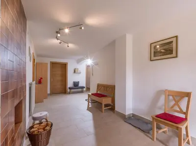 Ein Sitzbereich in der Unterkunft Appartements Bichldorf