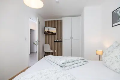 Ein Bett oder Betten in einem Zimmer der Unterkunft Apart Schachinger
