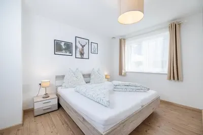 Ein Bett oder Betten in einem Zimmer der Unterkunft Apart Schachinger